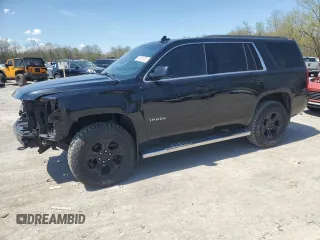 2019 Chevrolet Tahoe LS z VIN 1GNSKAKCXKR220980, wystawiony jako Copart lot #53061055 z przebiegiem 107 024 mil mil oraz Szkoda całkowita • Salvage title. Historia ofert i sprzedaży dostępna na DreamBid. Obrazek 1.