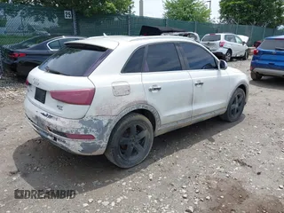 2015 Audi Q3 Premium Plus z VIN WA1EFCFS8FR001278, wystawiony jako IAAI lot #42475043 z przebiegiem 125 417 mil mil oraz . Historia ofert i sprzedaży dostępna na DreamBid. Obrazek 4.