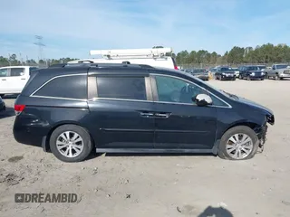 2015 Honda Odyssey EX-L with VIN 5FNRL5H65FB088106, listed as a IAAI auction lot 41880915 with 176,539 mi miles and . Bid and sale history available at carsss.com. Image 13.
