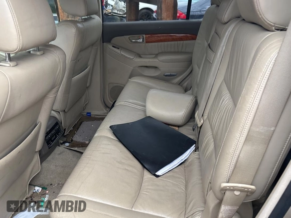 2006 Lexus GX 470 z VIN JTJBT20X960124511, wystawiony jako Copart lot #56307145 z przebiegiem 190 309 mil mil oraz Tytuł czysty. Historia ofert i sprzedaży dostępna na DreamBid. Obrazek 6.