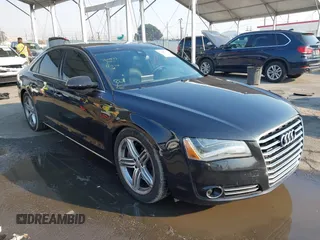 2011 Audi A8 z VIN WAUAVAFD6BN023937, wystawiony jako IAAI lot #41288464 z przebiegiem 158 127 mil mil oraz . Historia ofert i sprzedaży dostępna na DreamBid. Obrazek 1.