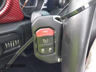 2021 Jeep Wrangler Unlimited Willys с VIN 1C4HJXDG2MW646904, выставлен на аукционе IAAI как лот 42267506 с пробегом 55 530 миль миль и . История ставок и продаж доступна на DreamBid. Изображение 11.