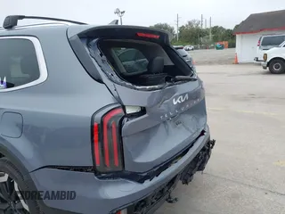 2023 Kia Telluride EX with VIN 5XYP34GC7PG356057, listed as a IAAI auction lot 41475968 with 37,832 mi miles and . Bid and sale history available at DreamBid. Image 6.