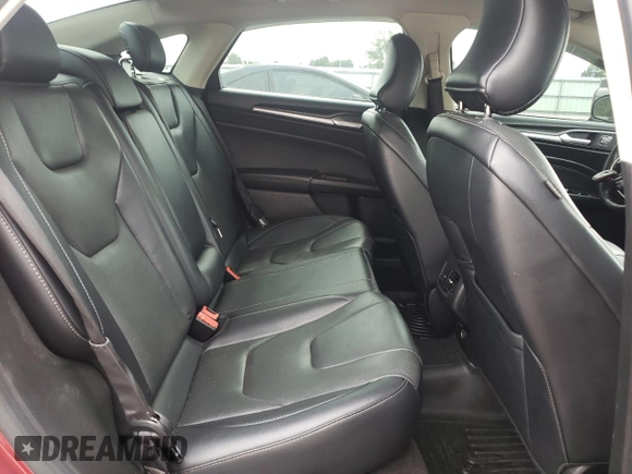 2019 Ford Fusion Titanium z VIN 3FA6P0D99KR221328, wystawiony jako Copart lot #57104515 z przebiegiem 138 427 mil mil oraz Szkoda całkowita • Salvage title. Historia ofert i sprzedaży dostępna na DreamBid. Obrazek 10.