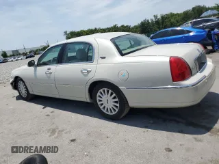 2005 Lincoln Town Car Signature Limited z VIN 1LNHM82W25Y606458, wystawiony jako Copart lot #58135655 z przebiegiem Nie podano mil oraz Szkoda całkowita • Salvage title. Historia ofert i sprzedaży dostępna na DreamBid. Obrazek 2.