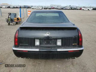 1999 Cadillac Eldorado Touring z VIN 1G6ET1298XU602343, wystawiony jako Copart lot #44327195 z przebiegiem 52 327 mil mil oraz Szkody całkowita. Historia ofert i sprzedaży dostępna na DreamBid. Obrazek 6.