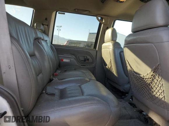 1999 GMC Denali z VIN 1GKEK13R5XR503159, wystawiony jako Copart lot #89018655 z przebiegiem 229 819 mil mil oraz Czysty tytuł • Clean title. Historia ofert i sprzedaży dostępna na DreamBid. Obrazek 11.