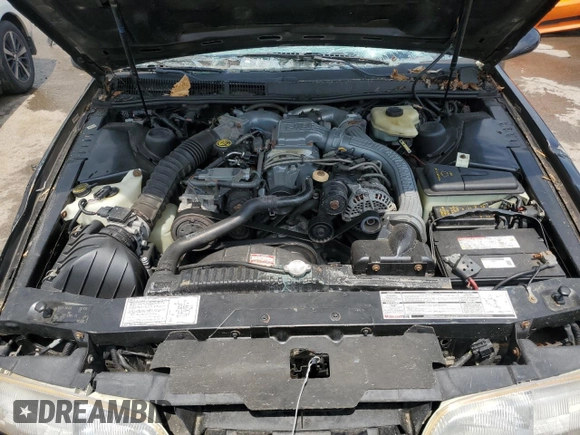 1989 Ford Thunderbird z VIN 1FAPP64R0KH161691, wystawiony jako Copart lot #60097275 z przebiegiem 70 041 mil mil oraz Szkoda całkowita • Salvage title. Historia ofert i sprzedaży dostępna na DreamBid. Obrazek 11.