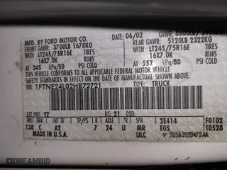 2002 Ford Econoline Cargo Van with VIN 1FTNE24L02HB72721, listed as a IAAI auction lot 41426289 with NaN miles. Bid and sale history available at carsss.com. Image 9.
