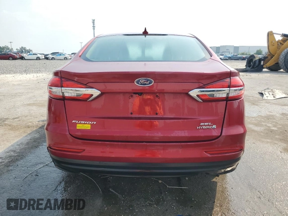 2019 Ford Fusion Hybrid SEL with VIN 3FA6P0MU9KR136851, listed as a Copart auction lot 51752575 with 104,637 mi miles and Salvage Title. Bid and sale history available at carsss.com. Image 6.