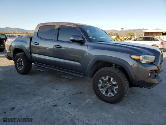 2021 Toyota Tacoma 4WD SR with VIN 3TMCZ5AN8MM453084, listed as a Copart auction lot 46718395 with 72,417 mi miles and Salvage Title. Bid and sale history available at carsss.com. Image 4.