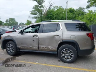 2023 GMC Acadia SLT with VIN 1GKKNUL41PZ184357, listed as a IAAI auction lot 42439400 with 60,238 mi miles and . Bid and sale history available at DreamBid. Image 15.