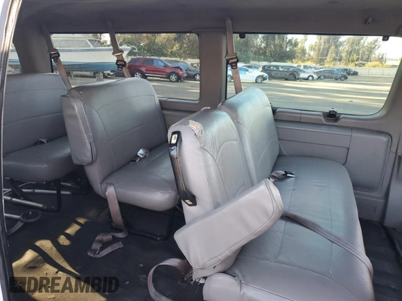 2000 Ford Econoline Passenger XL with VIN 1FBSS31L3YHB98619, listed as a Copart auction lot 77615904 with 316,815 mi miles and Clean Title. Bid and sale history available at DreamBid. Image 11.