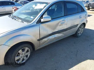 2009 Kia Rio LX with VIN KNADE243596530314, listed as a IAAI auction lot 41681050 with 114,831 mi miles. Bid and sale history available at carsss.com. Image 6.