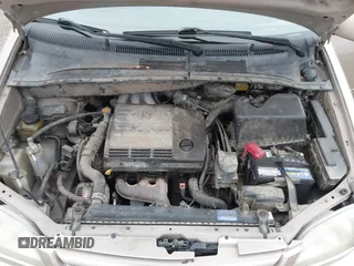 2002 Toyota Sienna LE with VIN 4T3ZF13C42U418853, listed as a IAAI auction lot 41248253 with 193,986 mi miles. Bid and sale history available at carsss.com. Image 9.