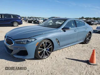2022 BMW 8 Series M850i with VIN WBAGV8C06NCH25022, listed as a Copart auction lot 82894104 with 26,864 mi miles and Non Repairable. Bid and sale history available at carsss.com. Image 1.