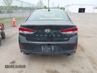2018 Hyundai Sonata Sport with VIN 5NPE34AF0JH710477, listed as a IAAI auction lot 42104684 with 158,260 mi miles and . Bid and sale history available at carsss.com. Image 17.