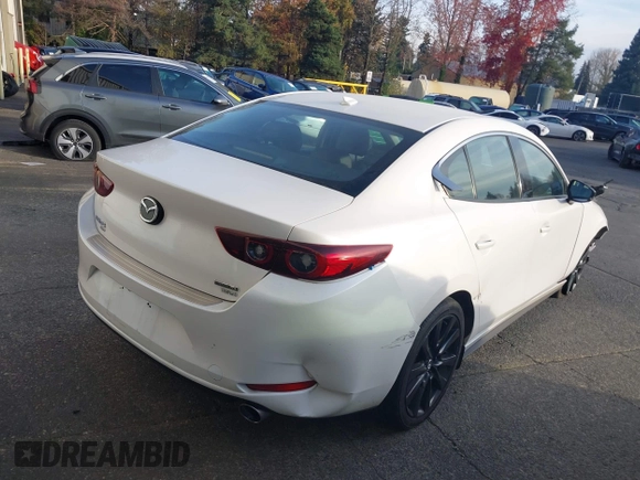 2022 Mazda 3 2.5 Turbo with VIN 3MZBPBAY2NM311824, listed as a IAAI auction lot 41038030 with 21,669 mi miles and . Bid and sale history available at DreamBid. Image 4.
