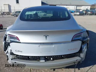 2018 Tesla Model 3 Long Range Battery with VIN 5YJ3E1EB9JF065057, listed as a IAAI auction lot 41863903 with 54,584 mi miles and . Bid and sale history available at DreamBid. Image 16.
