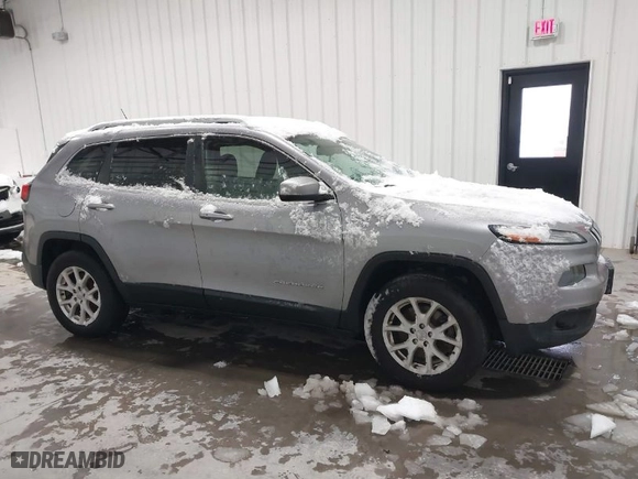 2014 Jeep Cherokee Latitude with VIN 1C4PJMCS9EW124434, listed as a IAAI auction lot 41582319 with 123,372 mi miles. Bid and sale history available at carsss.com. Image 13.