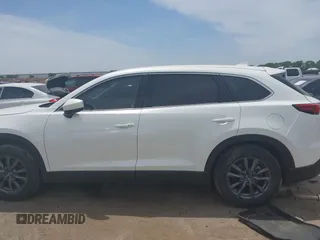 2021 Mazda CX-9 Touring with VIN JM3TCACY9M0526376, listed as a IAAI auction lot 42264478 with 74,671 mi miles and . Bid and sale history available at DreamBid. Image 14.
