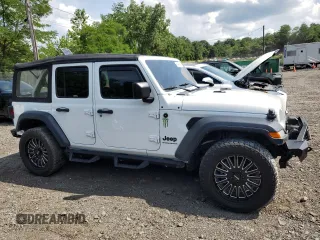 2023 Jeep Wrangler Sport with VIN 1C4HJXDGXPW596127, listed as a Copart auction lot 65395655 with 64,257 mi miles and Salvage title. Bid and sale history available at DreamBid. Image 4.