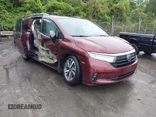 2021 Honda Odyssey Touring with VIN 5FNRL6H88MB006938, listed as a IAAI auction lot 42367022 with 63,280 mi miles and . Bid and sale history available at DreamBid. Image 1.