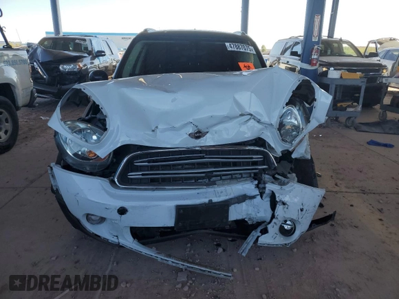 2015 MINI Countryman with VIN WMWZB3C50FWR45253, listed as a Copart auction lot 63608655 with 123,701 mi miles and Salvage title. Bid and sale history available at DreamBid. Image 5.