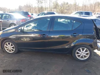 2013 Toyota Prius c One with VIN JTDKDTB36D1034076, listed as a IAAI auction lot 41622385 with 148,920 mi miles. Bid and sale history available at carsss.com. Image 14.
