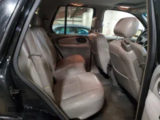 2002 Oldsmobile Bravada z VIN 1GHDT13S522107056, wystawiony jako Copart lot #86296454 z przebiegiem 169 856 mil mil oraz Tytuł czysty. Historia ofert i sprzedaży dostępna na DreamBid. Obrazek 11.