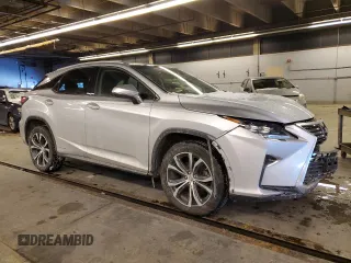 2016 Lexus RX 450h with VIN 2T2BGMCA2GC001405, listed as a Copart auction lot 45579795 with 129,086 mi miles and Salvage title. Bid and sale history available at DreamBid. Image 4.