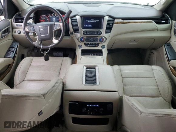 2016 GMC Yukon Denali with VIN 1GKS2CKJ8GR271098, listed as a Copart auction lot 42983315 with 109,582 mi miles and Salvage Title. Bid and sale history available at carsss.com. Image 8.