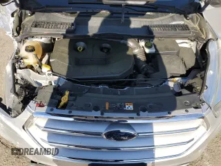2018 Ford Escape SE z VIN 1FMCU9G96JUB49271, wystawiony jako Copart lot #50553205 z przebiegiem 91 123 mil mil oraz Szkoda całkowita • Salvage title. Historia ofert i sprzedaży dostępna na DreamBid. Obrazek 12.