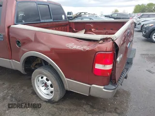 2005 Ford F-150 XLT with VIN 1FTPW14545KC40740, listed as a IAAI auction lot 41932653 with 164,641 mi miles. Bid and sale history available at carsss.com. Image 14.