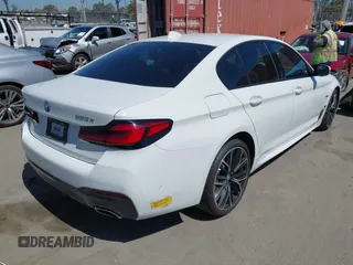 2022 BMW 5 Series 530e xDrive with VIN WBA33AG01NCJ52906, listed as a IAAI auction lot 42686511 with 45,710 mi miles and . Bid and sale history available at DreamBid. Image 4.