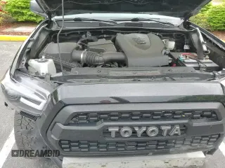 2022 Toyota Tacoma SR с VIN 3TYRZ5CN1NT016153, выставлен на аукционе Copart как лот 56624785 с пробегом 88 633 миль миль и Чистый • Clean title. История ставок и продаж доступна на DreamBid. Изображение 13.