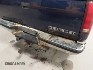 1999 Chevrolet Suburban z VIN 1GNFK16R1XJ409829, wystawiony jako IAAI lot #42045240 z przebiegiem 337 554 mil mil oraz . Historia ofert i sprzedaży dostępna na DreamBid. Obrazek 15.