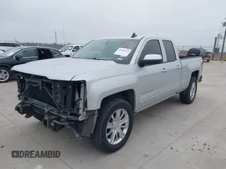 2018 Chevrolet Silverado 1500 LT with VIN 1GCRCREH8JZ172209, listed as a IAAI auction lot 41569533 with 144,475 mi miles and . Bid and sale history available at DreamBid. Image 2.