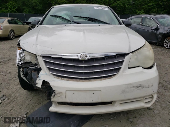 2010 Chrysler Sebring Touring z VIN 1C3CC4FB5AN192786, wystawiony jako Copart lot #56566445 z przebiegiem 194 869 mil mil oraz Szkoda całkowita • Salvage title. Historia ofert i sprzedaży dostępna na DreamBid. Obrazek 5.