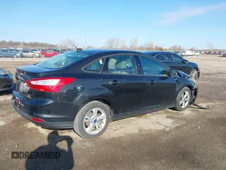 2013 Ford Focus SE with VIN 1FADP3F28DL260843, listed as a IAAI auction lot 41889090 with 131,636 mi miles. Bid and sale history available at carsss.com. Image 4.