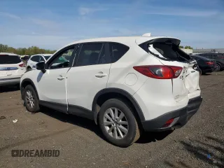 2015 Mazda CX-5 Touring with VIN JM3KE4CYXF0445980, listed as a Copart auction lot 55224355 with 183,713 mi miles and Salvage Title. Bid and sale history available at DreamBid. Image 2.