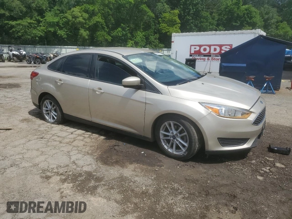 2018 Ford Focus SE with VIN 1FADP3F28JL292624, listed as a Copart auction lot 58960775 with 99,385 mi miles and Salvage title. Bid and sale history available at DreamBid. Image 4.