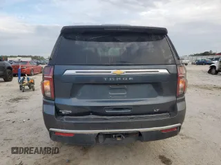 2021 Chevrolet Tahoe LT with VIN 1GNSCNKD5MR252123, listed as a Copart auction lot 42582425 with 114,130 mi miles and Salvage title. Bid and sale history available at DreamBid. Image 6.