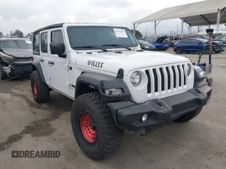 2023 Jeep Wrangler Sport S with VIN 1C4HJXDG0PW638871, listed as a IAAI auction lot 42129295 with 16,171 mi miles and . Bid and sale history available at DreamBid. Image 1.