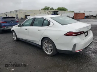 2024 BMW 5 Series 530i xDrive with VIN WBA53FJ01RCP97253, listed as a Copart auction lot 50888795 with 11,985 mi miles and Salvage title. Bid and sale history available at DreamBid. Image 2.