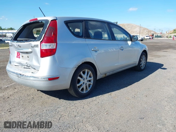 2009 Hyundai Elantra Touring z VIN KMHDC86E99U033025, wystawiony jako IAAI lot #42301392 z przebiegiem 154 455 mil mil oraz . Historia ofert i sprzedaży dostępna na DreamBid. Obrazek 4.