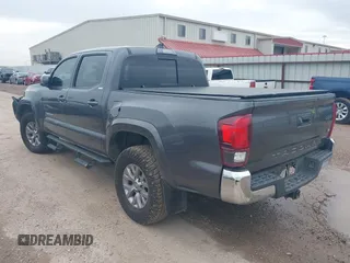 2018 Toyota Tacoma SR5 with VIN 5TFAZ5CN5JX062498, listed as a IAAI auction lot 41867393 with 128,879 mi miles and . Bid and sale history available at DreamBid. Image 3.