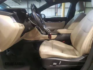 2017 Cadillac XT5 FWD with VIN 1GYKNARS0HZ257035, listed as a Copart auction lot 64284525 with 102,605 mi miles and Salvage title. Bid and sale history available at DreamBid. Image 7.
