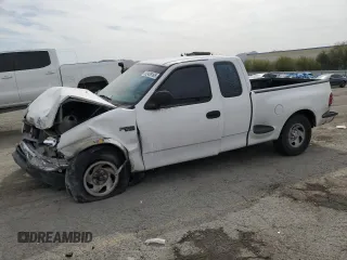 1999 Ford F-150 XL with VIN 1FTZX0721XKA49751, listed as a Copart auction lot 52429195 with Not provided miles and Salvage title. Bid and sale history available at DreamBid. Image 1.