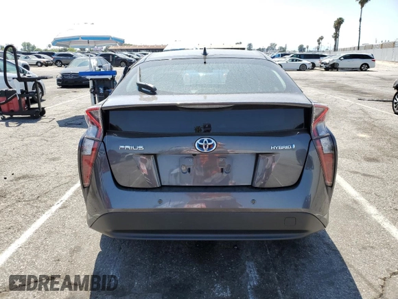 2018 Toyota Prius Two z VIN JTDKBRFU2J3058774, wystawiony jako Copart lot #58352045 z przebiegiem 109 711 mil mil oraz Szkoda całkowita • Salvage title. Historia ofert i sprzedaży dostępna na DreamBid. Obrazek 6.